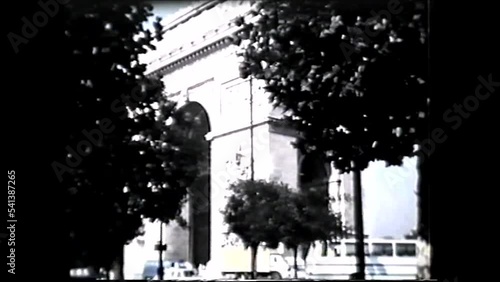 PARIS France 1960s ARCH DE TRIOMPHE, Champs-Elysees and traffic on the street - 1960s vintage video 8mm