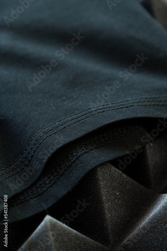Black plain cotton t-shirt sleeve close up