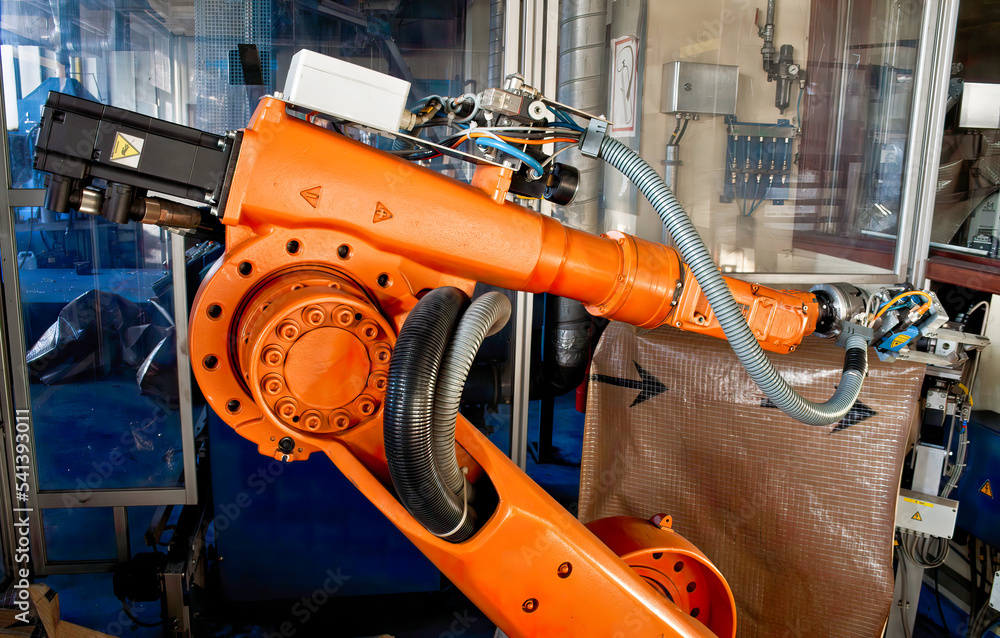 Robot arm production line, modern industrial technology, automated production cells. Robot arm production line, modern industrial technology, automated production cells.