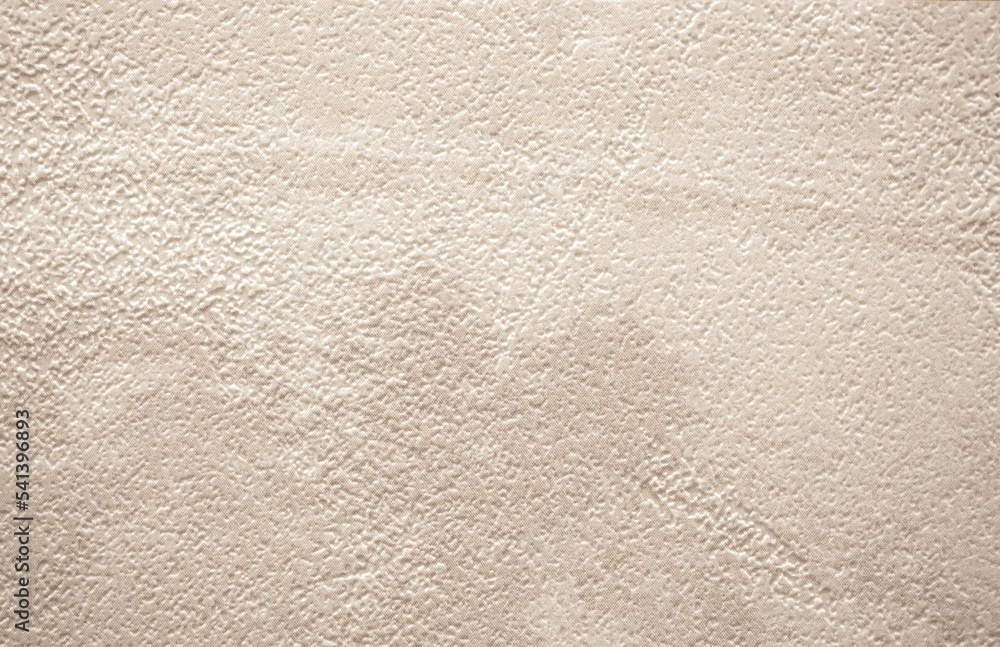Brown background from decorative plaster with abstract spots. Unusual beige wall texture with beautiful patterns, creative surface background. Front covering for facing of buildings. Brown background from decorative plaster with abstract spots. Unusual beige wall texture with beautiful patterns, creative surface background. Front covering for facing of buildings.