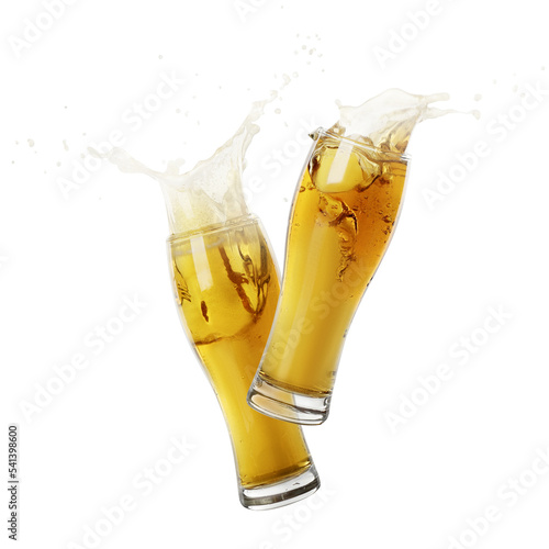Two glasses of beer toasting with splash on white background