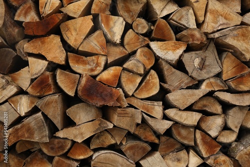 Stack of chopped firewood as background, closeup
