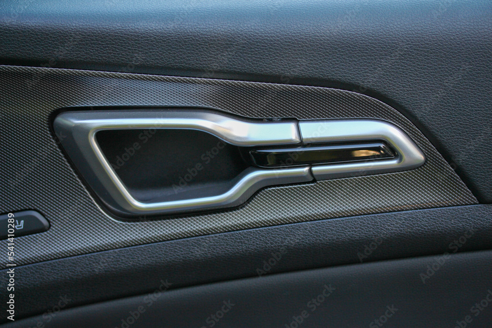 Stylish interior door handle of a modern vehicle