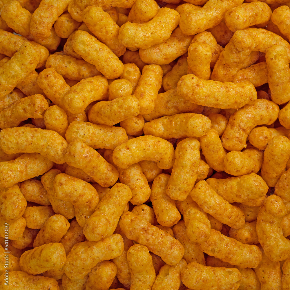 Erdnussflips in einer Nahaufnahme als Hintergrund Erdnussflips in einer Nahaufnahme als Hintergrund