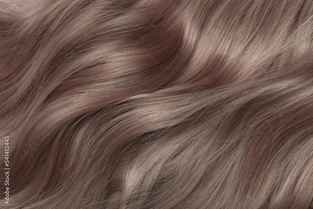 Blond hair close-up as a background. Women's long light brown hair.  Beautifully styled wavy shiny curls. Hair coloring. Hairdressing  procedures, extension. foto de Stock | Adobe Stock