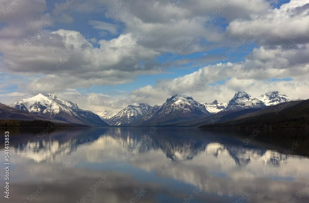 Time Lapse Lockdown Reflection Of Glacier Mountains In Lake At National Park - Glacier National Park, Montana Time Lapse Lockdown Reflection Of Glacier Mountains In Lake At National Park - Glacier National Park, Montana