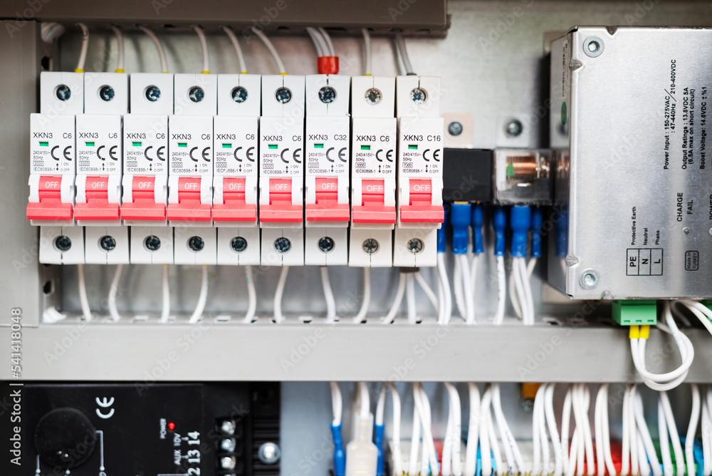 Voltage distributor with circuit breakers. New automated system of electric power supply and distribution. Electric boxes with high-voltage equipment.