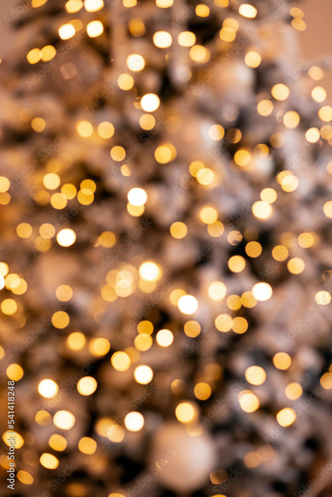 Defocused gold abstract christmas background. Texture Bokeh