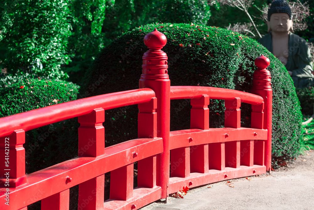 Red balustrade in park . Sidewalk in the Chinese park Red balustrade in park . Sidewalk in the Chinese park