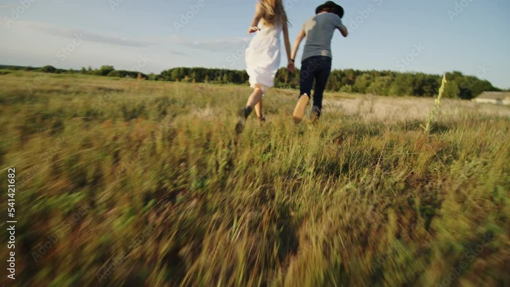 Loving couple fools around enjoying countryside life Loving couple fools around enjoying countryside life