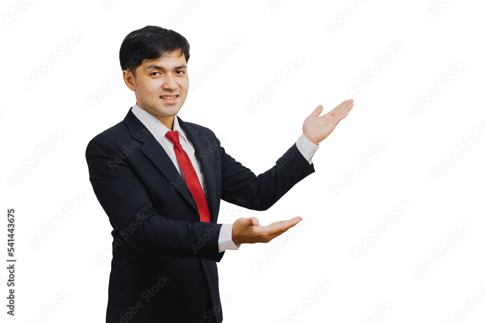 Asian businessman in suit pointing to present Asian businessman in suit pointing to present