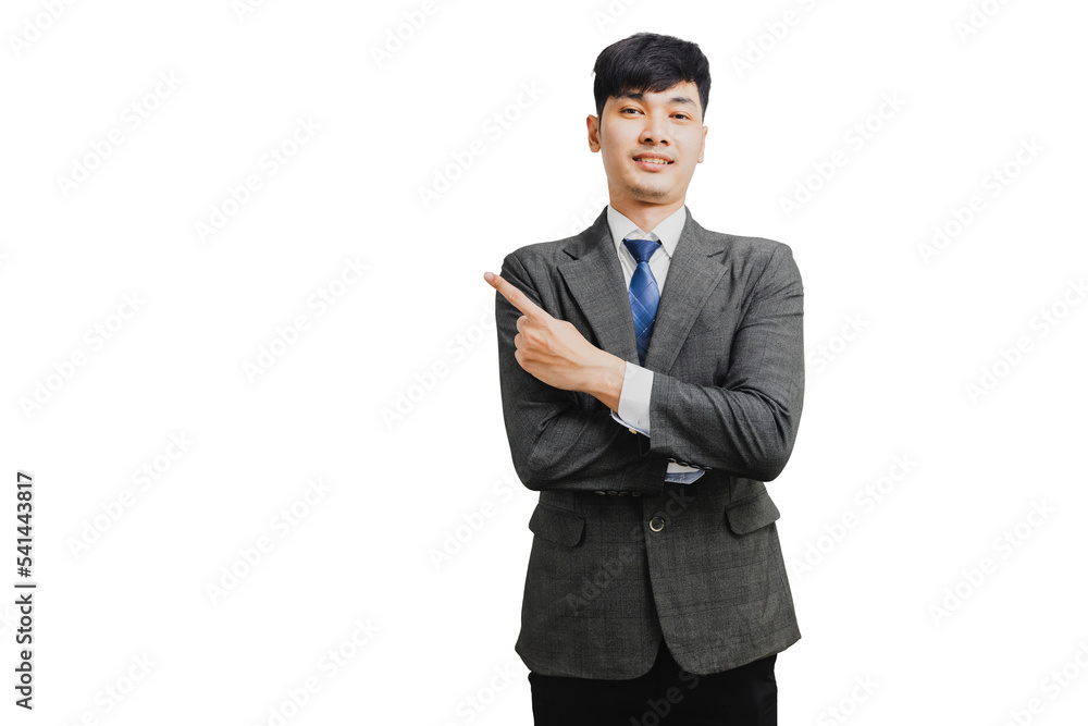 Asian handsome businessman in suit pointing to present Asian handsome businessman in suit pointing to present
