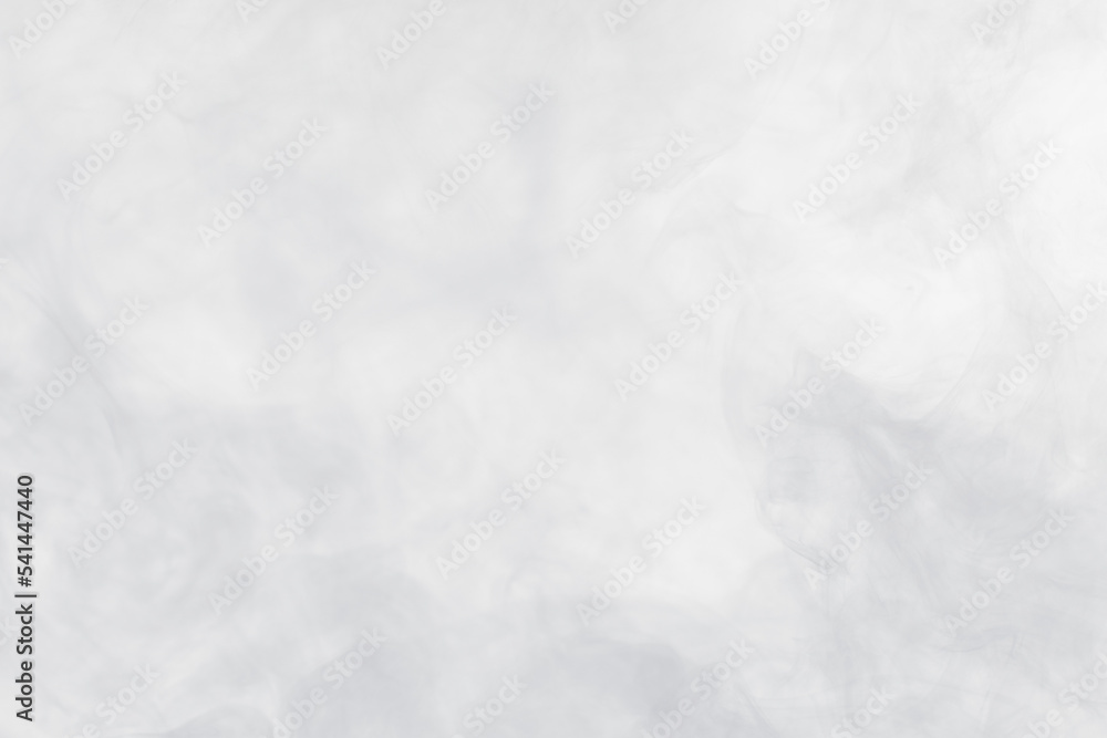 Naklejka premium Dense Fluffy Puffs of White Smoke and Fog on black Background, Abstract Smoke Clouds, Movement Blurred out of focus. Smoking blows from machine dry ice fly fluttering in Air, effect texture, png