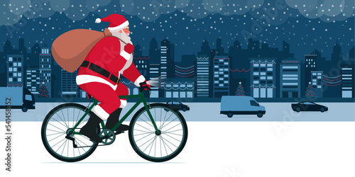 Santa Claus riding a bicycle and carrying a sack