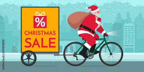 Santa Claus riding a bicycle with trailer advertising