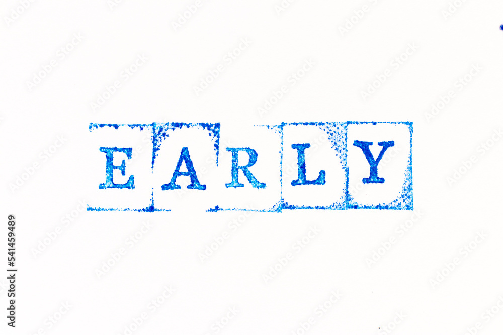 Obraz premium Blue color ink rubber stamp in word early on white paper background