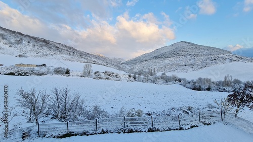 Winter landscape with a view of a snowy mountain © Zutik