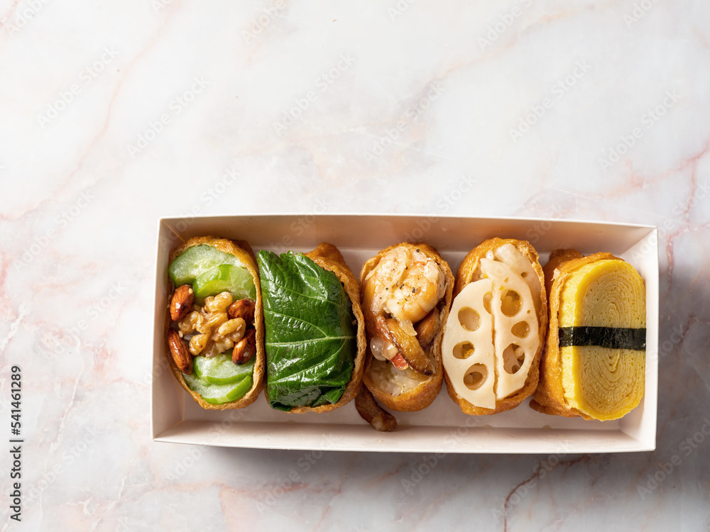 Fried Tofu Rice Balls topped with various vegetables Stock Photo