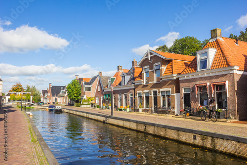Obraz na płótnie Old houses at the central canal of Kollum, Netherlands w salonie