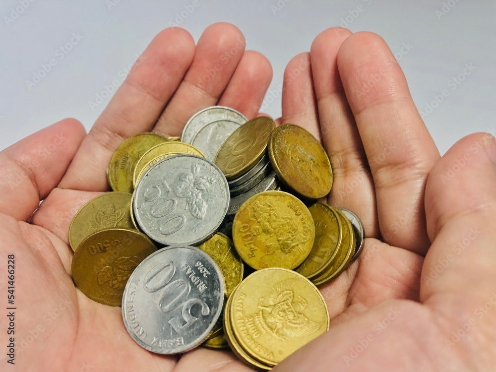 coins in hand