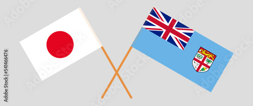 Crossed flags of Japan and Fiji. Official colors. Correct proportion