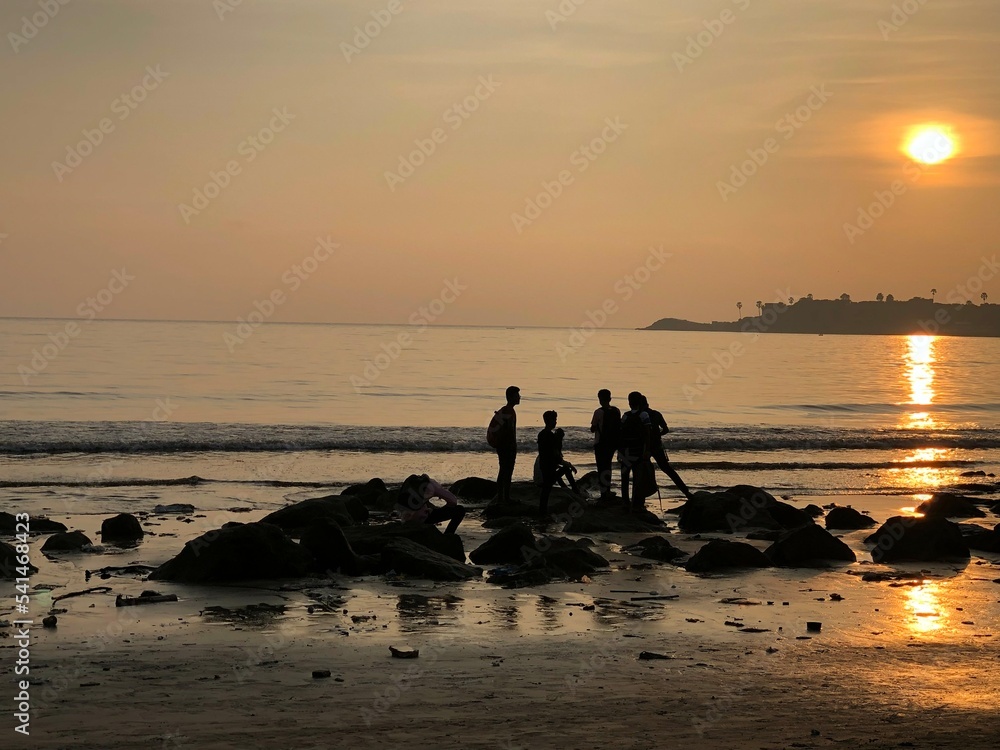 Fototapeta premium Sunset At the Beach Rocks