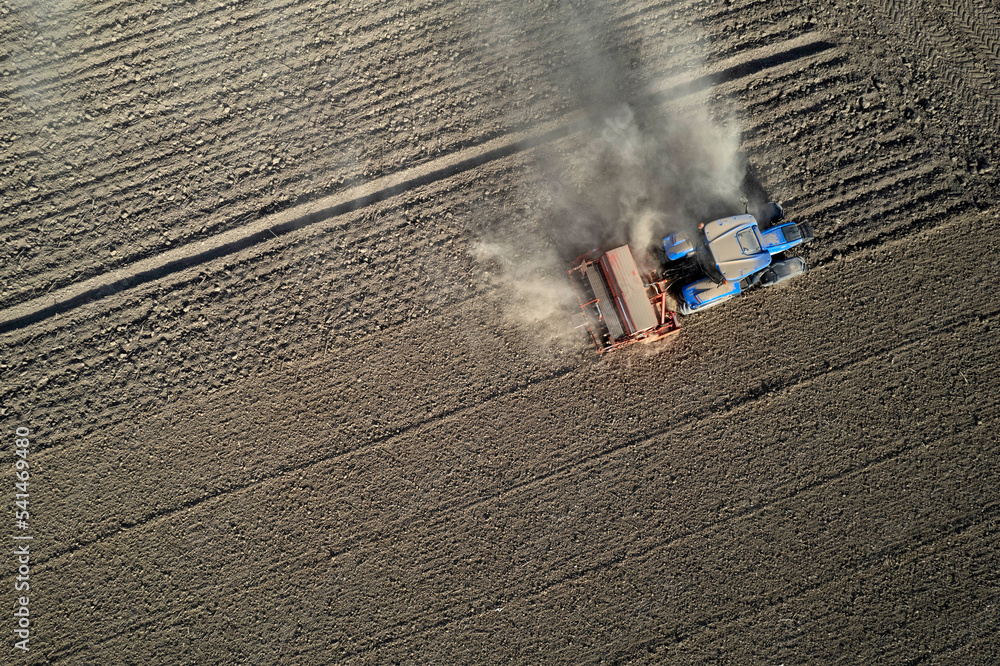 Aerial view of a tractor in the moment of sowing