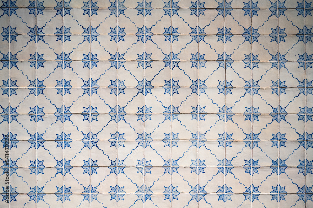White and blue tile in the wall