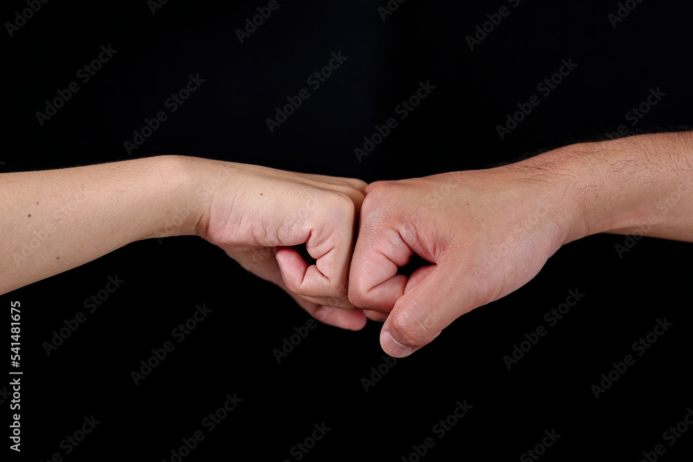 Female hand isolated on black background