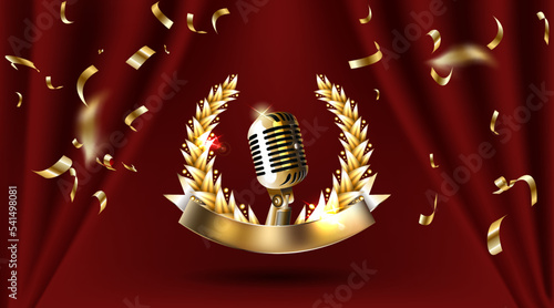 Vintage gold metal microphone. Red curtain background with spotlight.