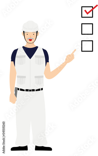 大工の男性のポーズ、チェックリストを指さす
