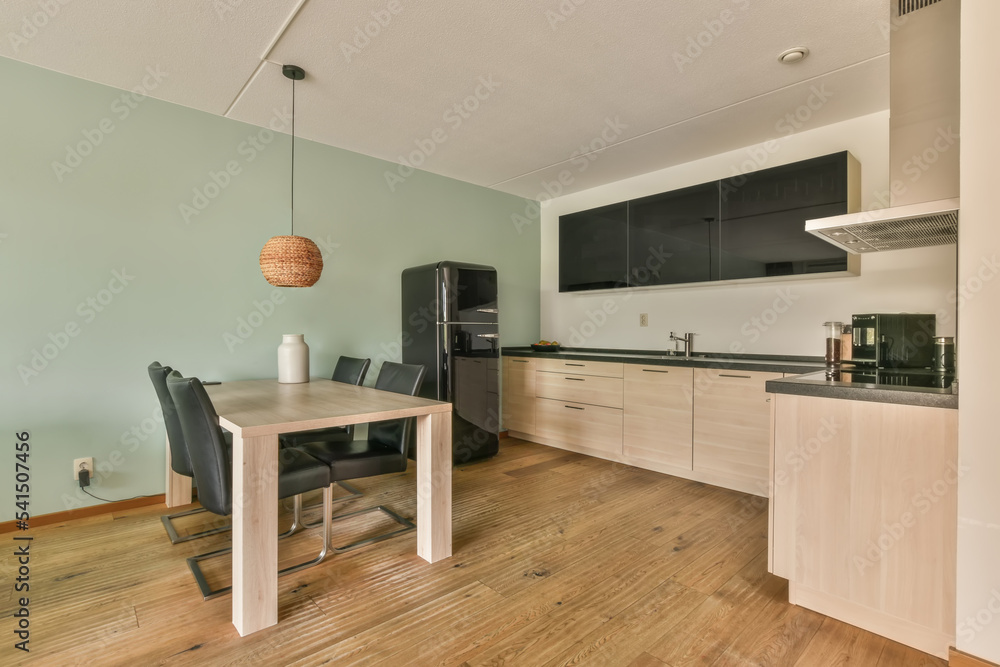Modern Home With Furniture next to a kitchen Modern Home With Furniture next to a kitchen