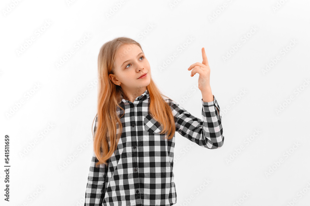 Portrait of upset modern teen girl using mobile phone, chatting in app, standing in casual shirt over white background Portrait of upset modern teen girl using mobile phone, chatting in app, standing in casual shirt over white background