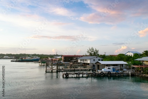 Beautiful shot of a harbor in Utila Island, Honduras during unset