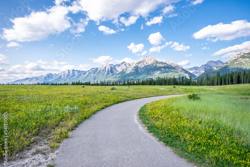 Trans Canada Trail Hike Paved Pathway in Rocky Mountains, Canmore, Alberta. High quality photo