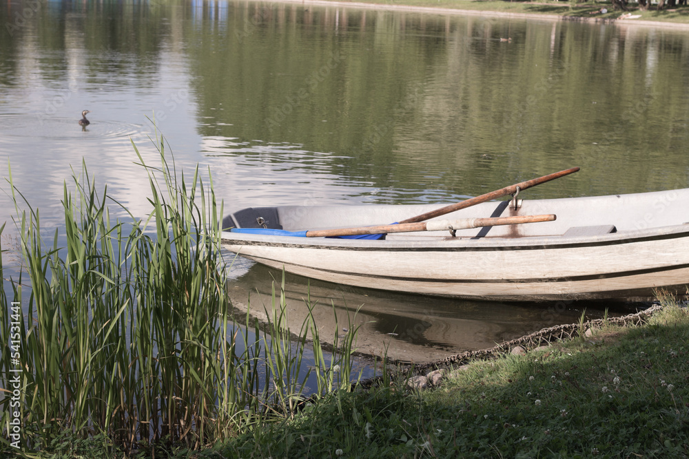 Empty boat near the lake in the summer Empty boat near the lake in the summer