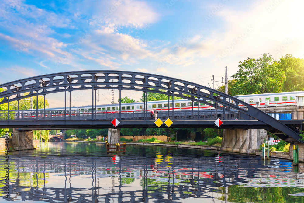 German railways over the Spree river, beautiful sunny image of modern Berlin, Germany German railways over the Spree river, beautiful sunny image of modern Berlin, Germany