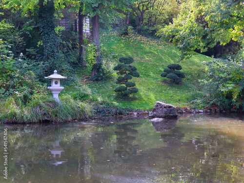 japanese garden in autumn with pond