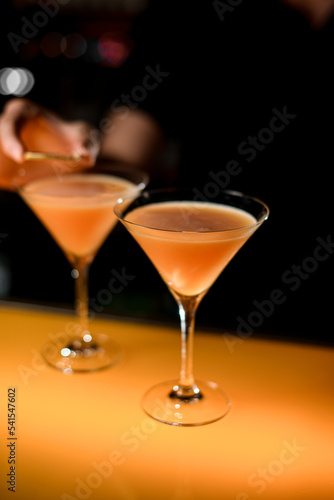 selective focus on thick cocktail in martini glass on bar counter