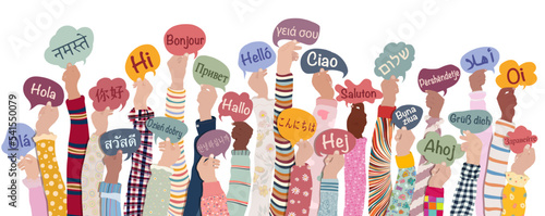 Photographie Many hands raised of diverse and multicultural children and teens holding speech bubbles with text -hallo- in various international languages