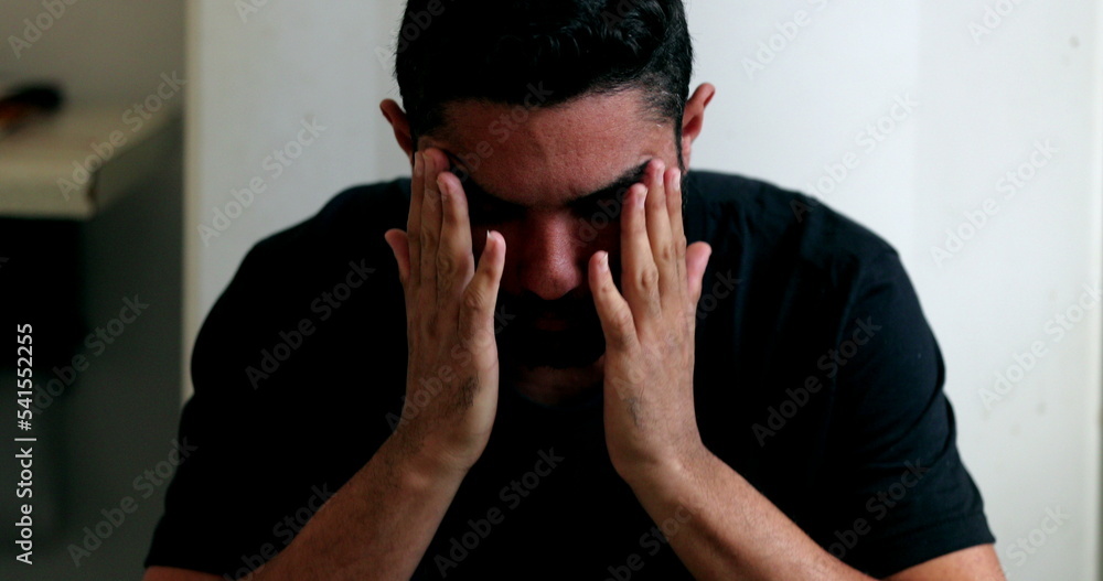 Anxious hispanic man feeling worry and PREOCCUPATION Anxious hispanic man feeling worry and PREOCCUPATION