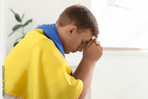Young man with flag of Ukra...