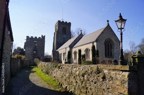 A view of St Nicholas Church in West Tanfield, England (UK) photo