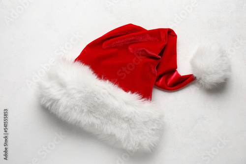 Red Santa hat on light background