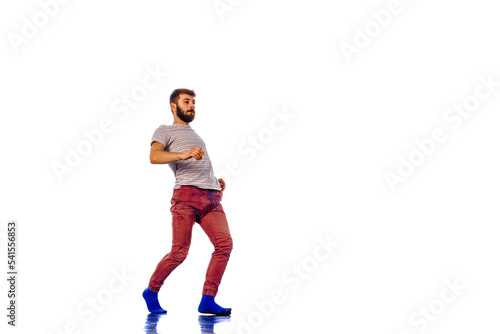 Modern boy standing isolated on white background