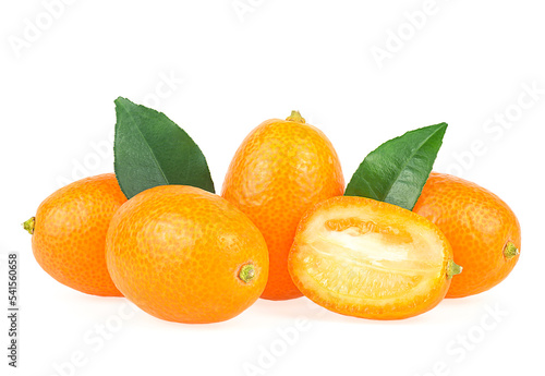Fresh kumquat fruits with green leaves isolated on a white background. Delicious and juicy kumquat fruits.