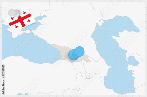 Map of Georgia with a pinned blue pin. Pinned flag of Georgia.