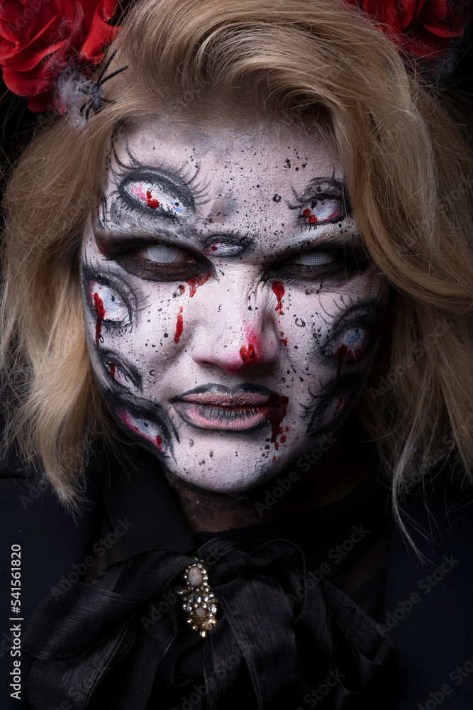 Frightening woman on a black background. Frightening woman on a black background.