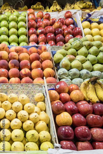 Vertical photography of fresh fruit in a stand in a Mexican market  a photo of fruit exhibited in Oaxaca market.