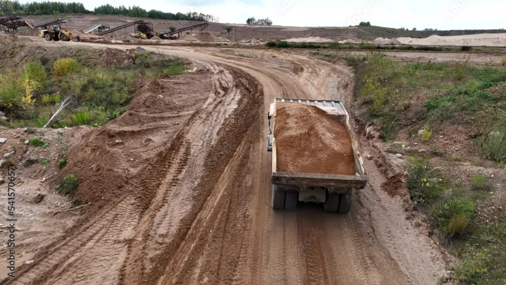 Shuttle Rake Opencast Mining truck transportation of loosened rock mass. Haulage and ...